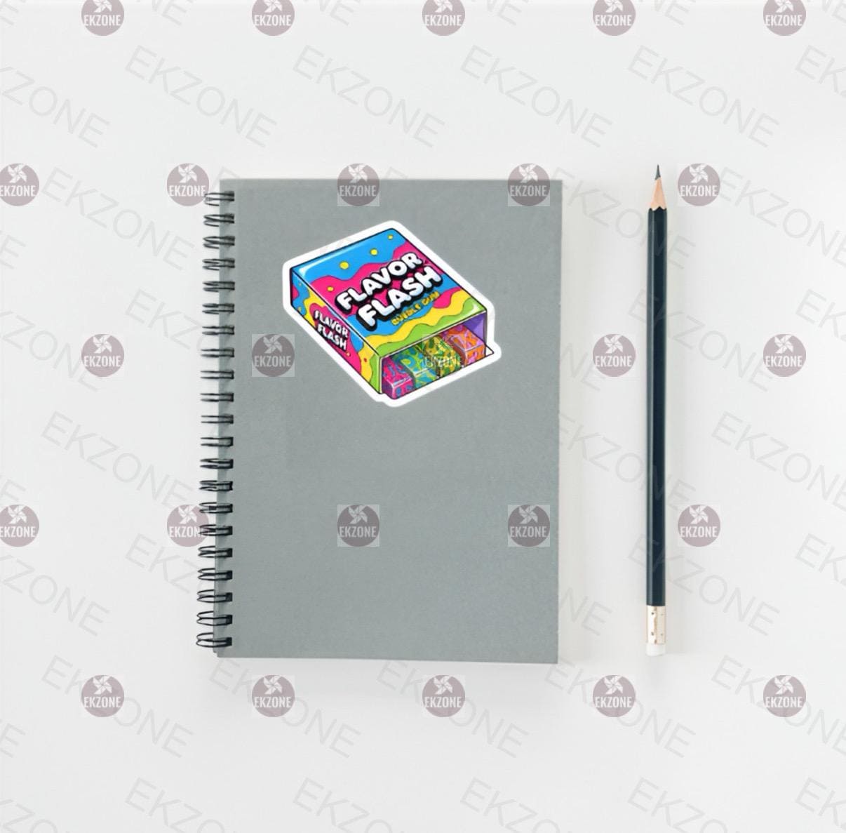 Gray notebook with a colorful sticker and a pencil on a white background