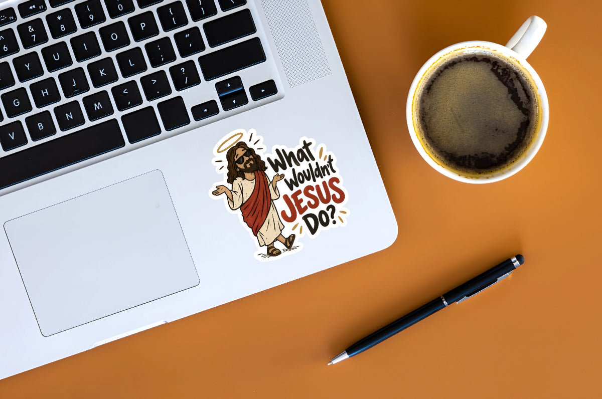 What Wouldn’t Jesus Do funny Christian vinyl sticker displayed on a silver laptop