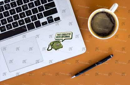 Laptop with a coffee cup and pen on a branded surface