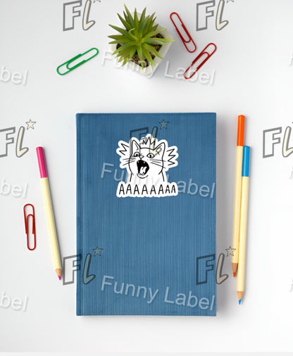 Blue notebook with a sticker on a white background with stationery items