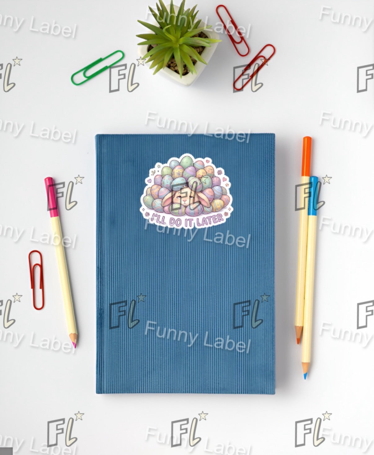 Blue notebook with a sticker on a white background with stationery items and 'Funny Label' branding.