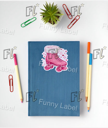 Blue notebook with a pink roller skate design on a white background with stationery items and 'Funny Label' branding.
