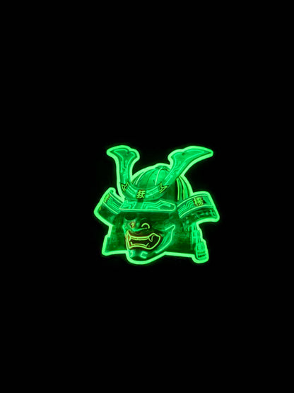 Glowing green Neon Samurai Helmet on a black background