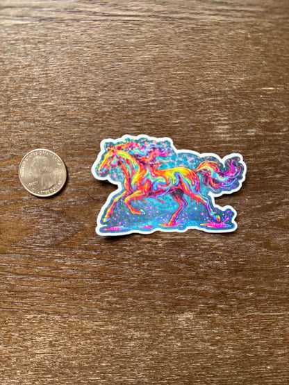 Colorful abstract sticker on a wooden surface with a coin for scale