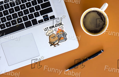 Laptop with a sticker on a desk next to a coffee cup and pen