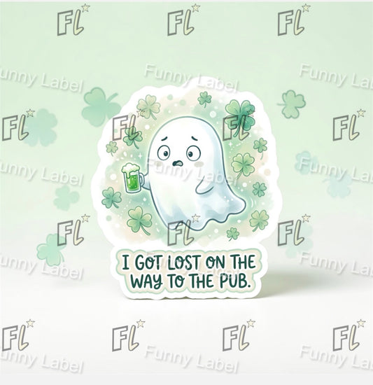 Sticker with a ghost holding a beer mug and text 'I got lost on the way to the pub.' on a light green background with shamrock patterns and 'FL' branding.