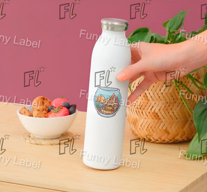 White water bottle with a colorful design held by a hand on a wooden surface with a pink background.