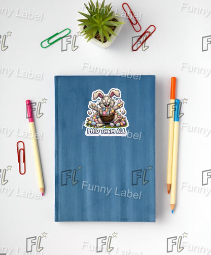 Blue notebook with a sticker on a white background with stationery items.