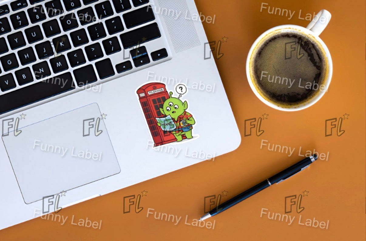 Laptop with stickers, coffee cup, and pen on a surface with 'Funny Label' branding.