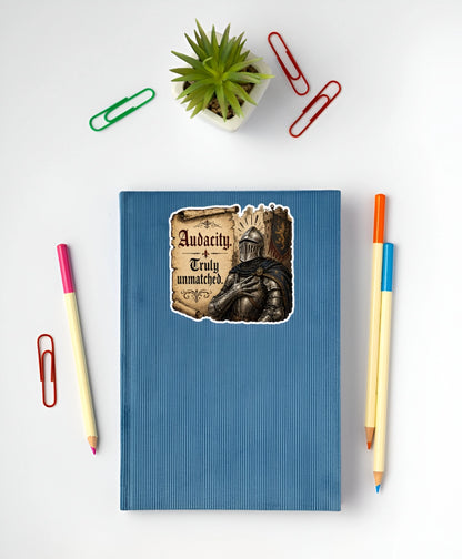 Audacity Truly Unmatched medieval knight sticker displayed on a blue notebook