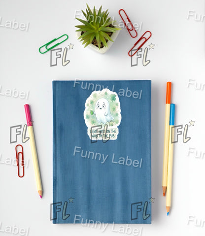 Blue notebook with a hedgehog design on a white background with stationery items.