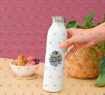 White water bottle with 'Class of 2026 Graduate' design held by a hand on a wooden surface with a bowl of fruit and cookies.