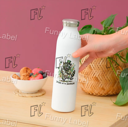 White water bottle with 'FL Funny Label' branding held by a hand on a wooden surface with food and plants.