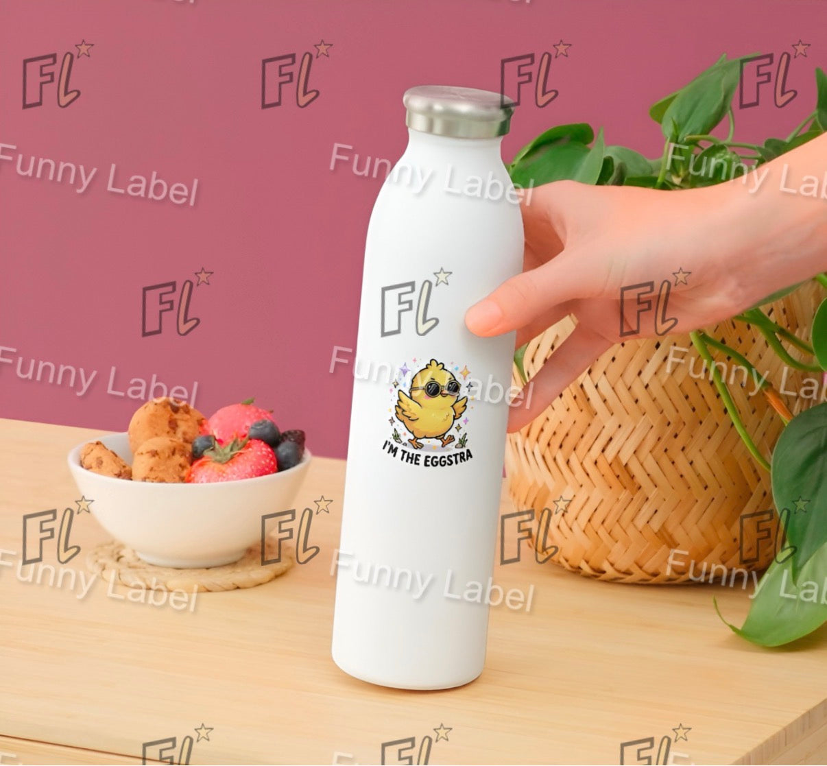 White water bottle with a cartoon chicken design and 'FL' branding on a wooden table.