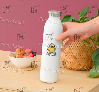 White water bottle with a cartoon chicken design and 'FL' branding on a wooden table.