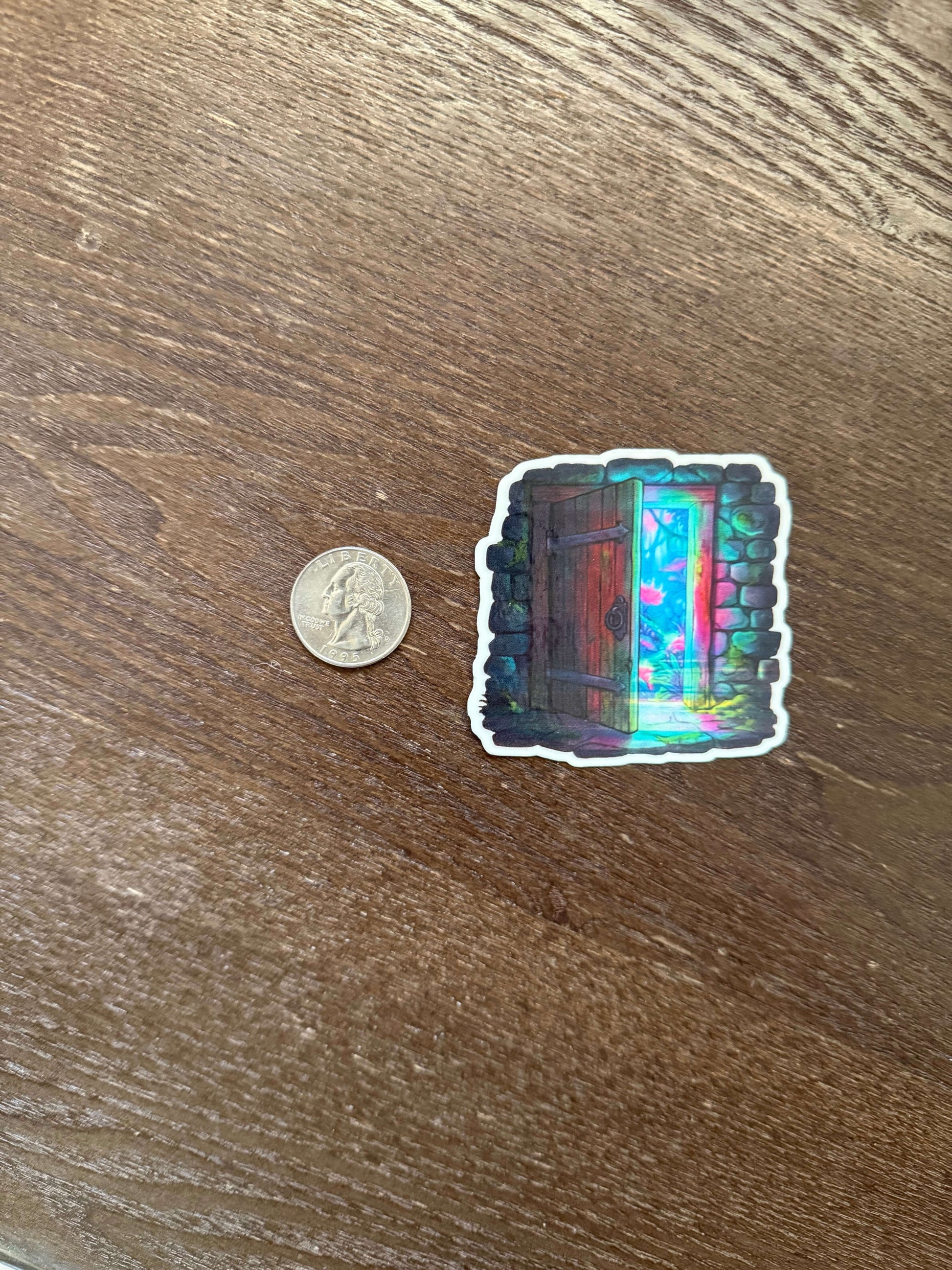 Holographic sticker on a wooden surface with a coin for scale