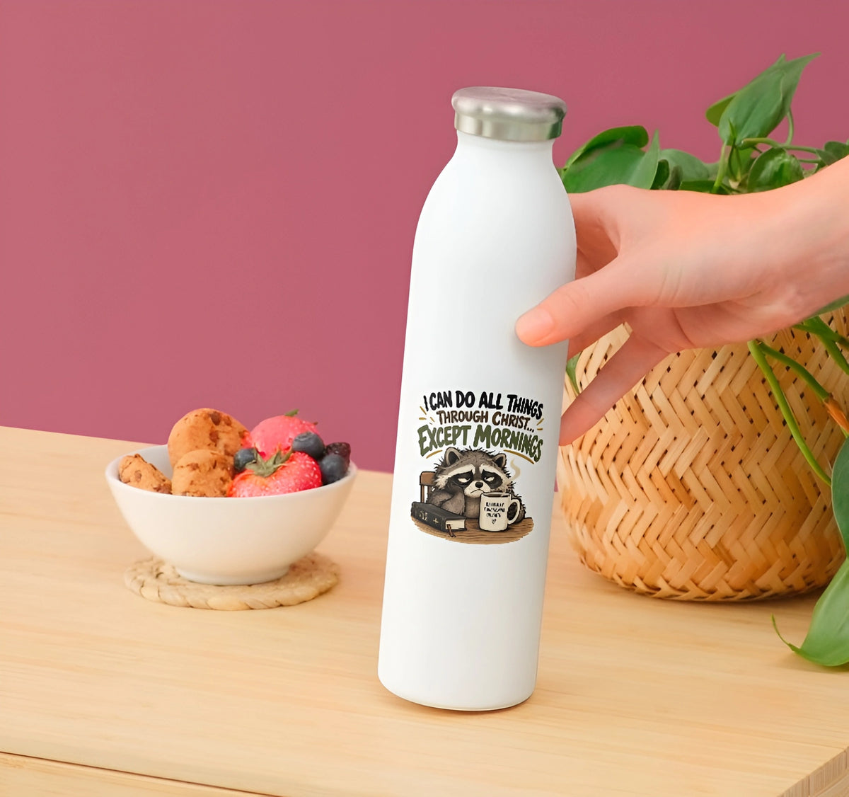 Funny Christian raccoon and coffee sticker displayed on a white reusable water bottle