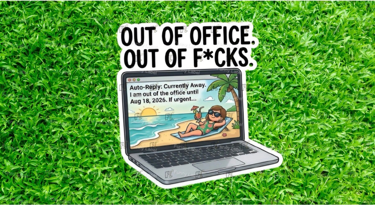 Laptop on grass with beach-themed 'out of office' message
