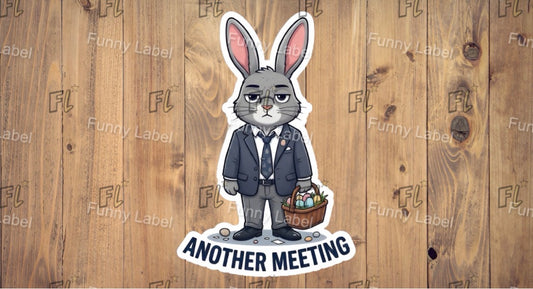 Sticker of a rabbit in a suit with 'Another Meeting' text on a wooden background with 'Funny Label' branding.