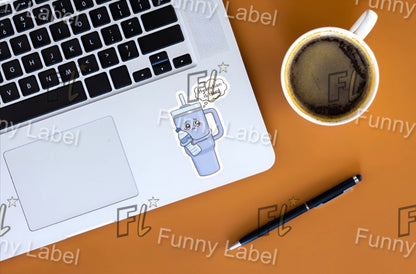 Laptop with stickers, coffee cup, and pen on a brown surface with 'Funny Label' branding.