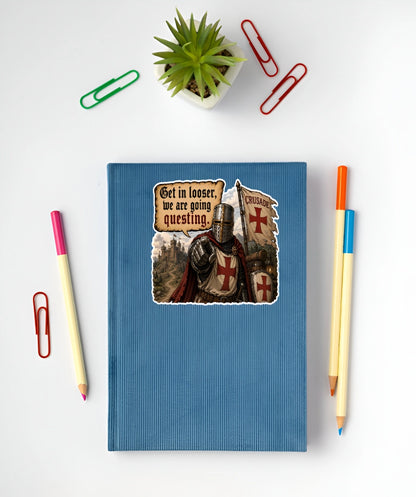 Get In Looser We Are Going Questing sticker displayed on a blue notebook