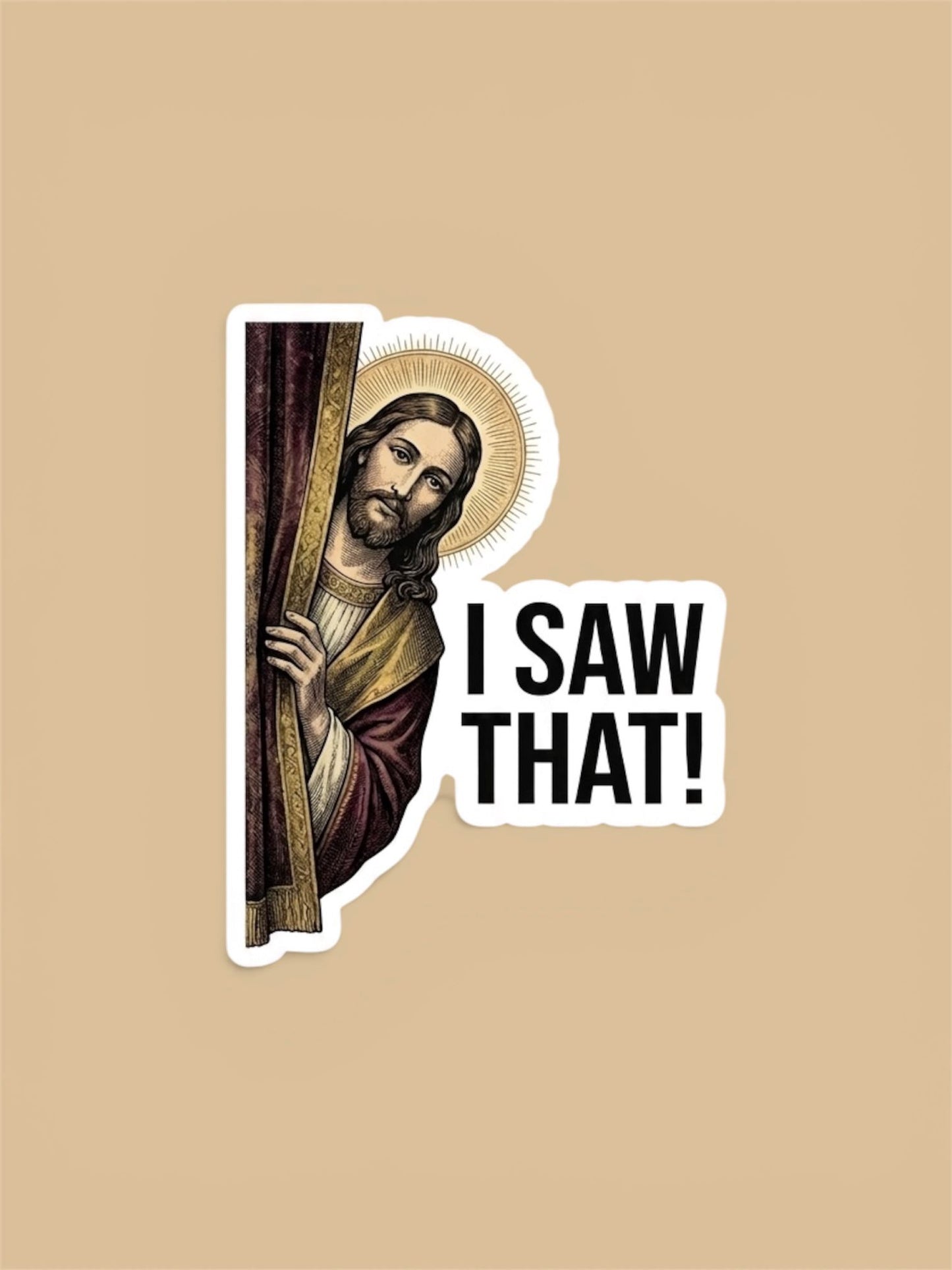 Sticker of a Jesus Christ with 'I Saw That!' text on a beige background