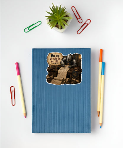 Funny Per My Previous Scroll medieval sticker displayed on a blue notebook