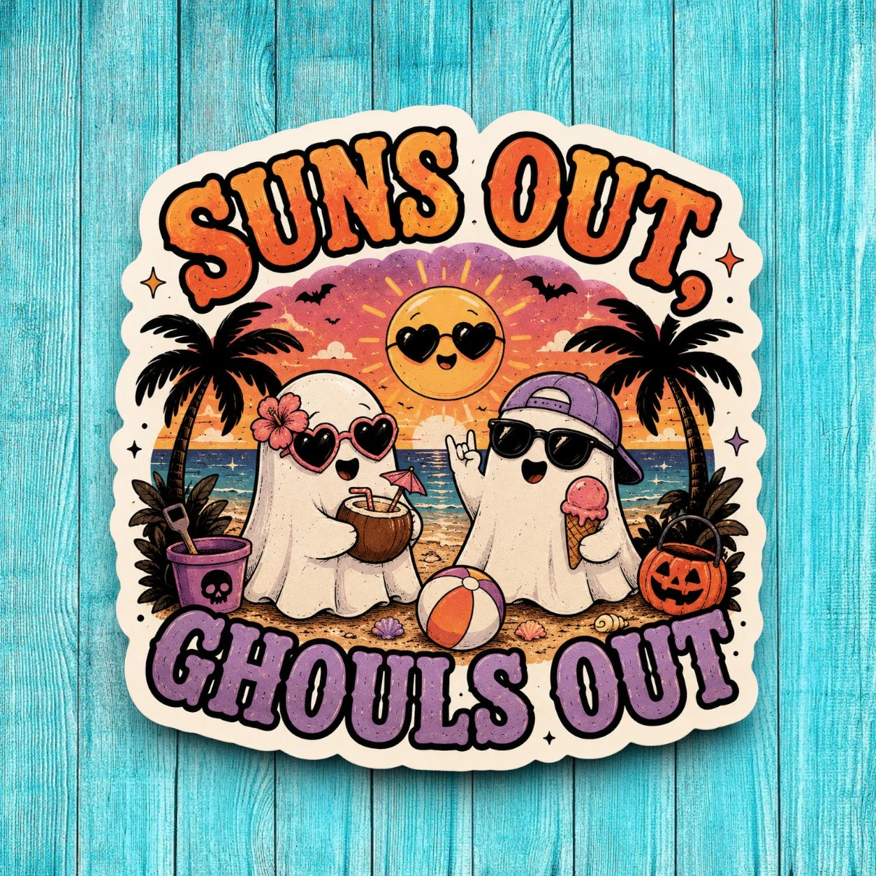 Sticker with cartoon ghosts, a sun, and beach elements on a blue wooden background.