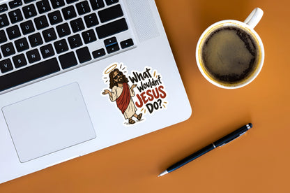 What Wouldn’t Jesus Do funny Christian vinyl sticker displayed on a silver laptop