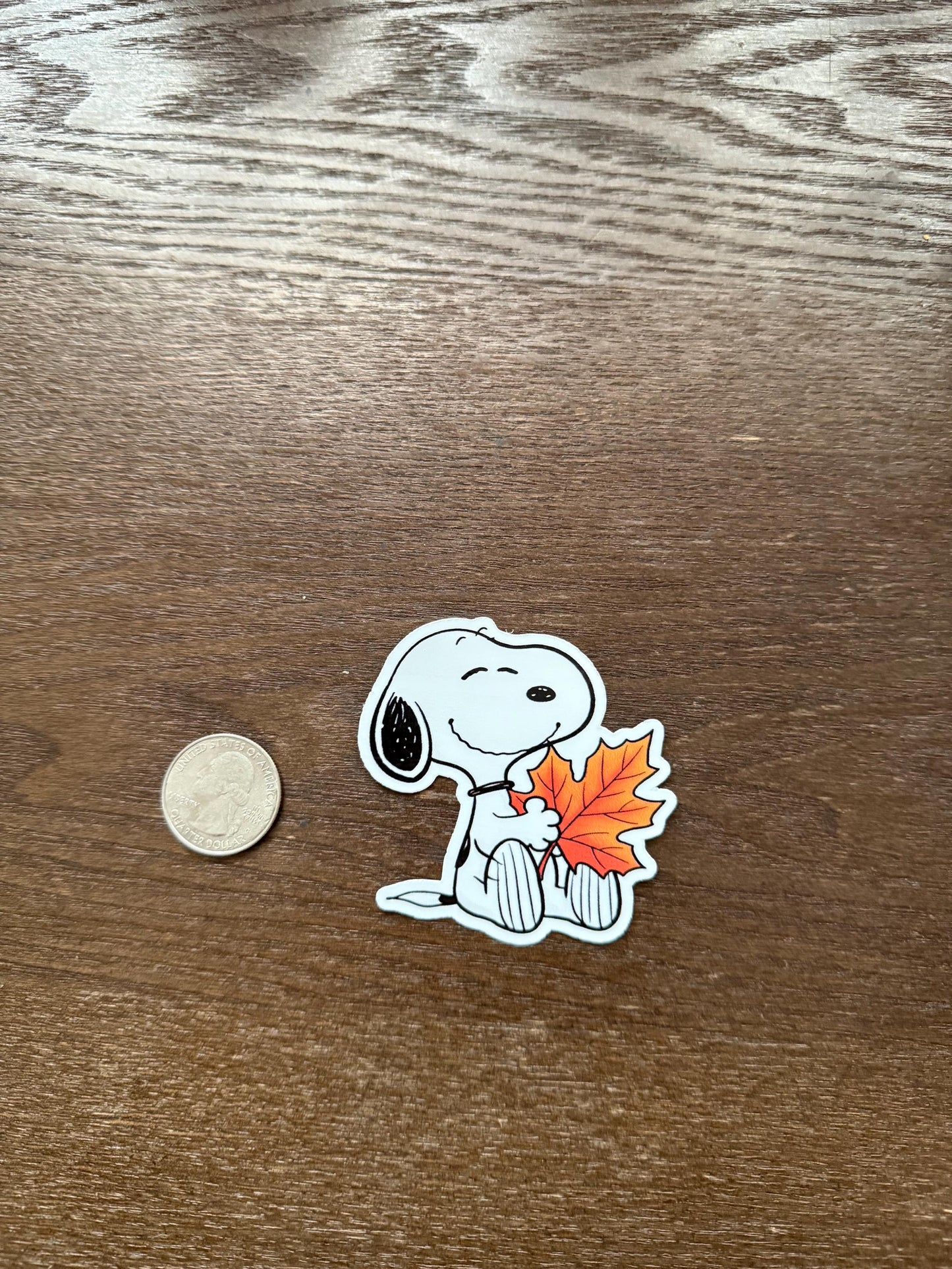 Snoopy Fall Leaf Sticker | Peanuts Autumn Decal | Cozy Vibes Art | Maple Leaf Vinyl | Nostalgic Fall Decor | Cute Dog Laptop Sticker