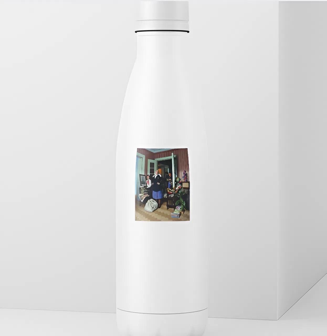 White bottle with a printed design on a white background