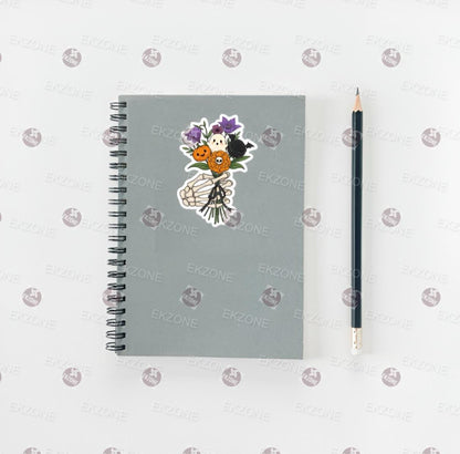 Notebook with decorative stickers and a pencil on a white background